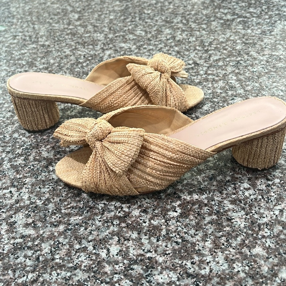 Exclusive Platinum Emilia Pleated Knot Mules
LOEFFLER RANDALL size 7B